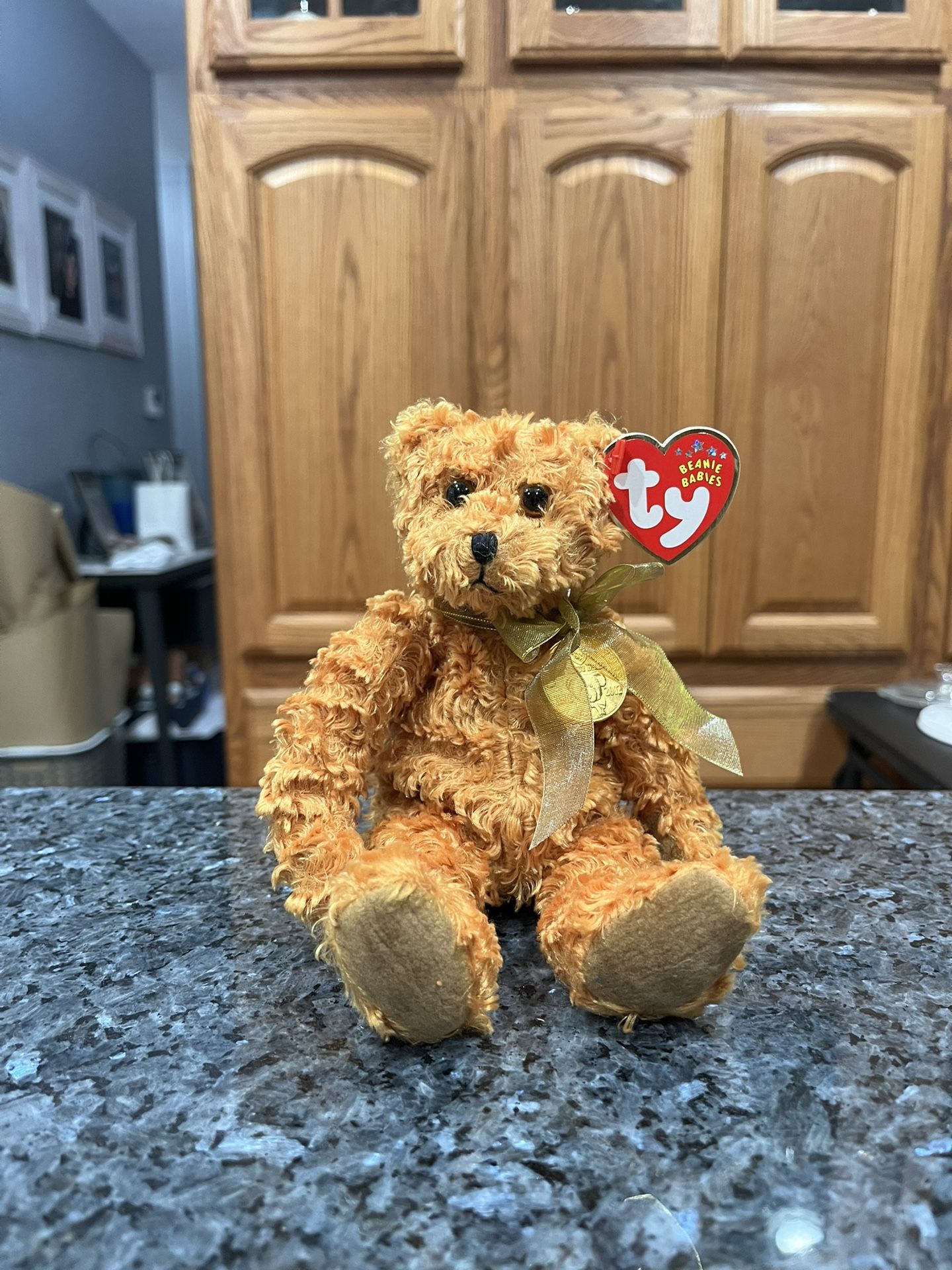 Ty Beanie Babie “100th Anniversary Teddy Bear 2002” Bear”.  Brand New with Tags.  New Size 7 inches Tall . Brand New With Tags 