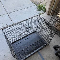 Smaller dog kennel and large dog kennel