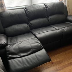 Bob’s Furniture Leather 85” Manual Gliding Sofa