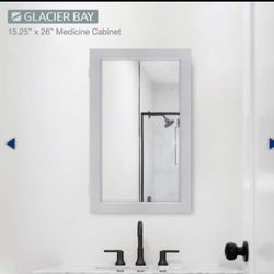  Glacier Bay 15-1/4 in. W x 26 in. H Framed Recessed or Surface-Mount Bathroom Medicine Cabinet with Mirror, Gray (Retail $64)