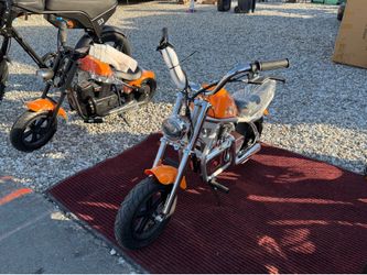Happyrun orange mini bike