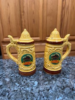 Vintage german Beer Stein Magic Mountain ,   Salt and Pepper Shakers . Size approximately 4 1/4 inches tall.  Preowned.  Made in Japan sticker on bott