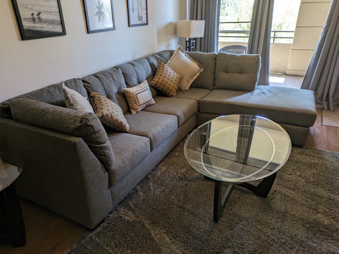 Sectional couch with full-sized hideabed 