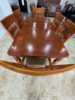 Wooden dinner table, 6 chairs, extension included