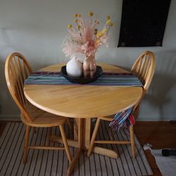 light wood foldable dining table w/ 4 chairs 