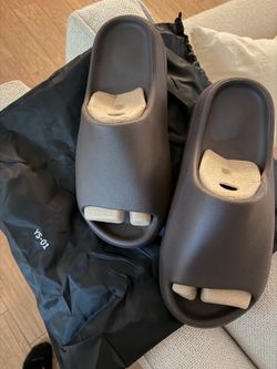Yeezy slides.  Size 10.  Chocolate