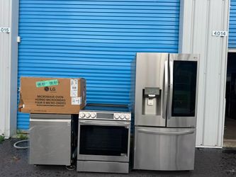 Complete LG kitchen set. Stainless steel stove, refrigerator, microwave, dishwasher.