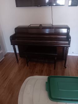 Antique piano with bench