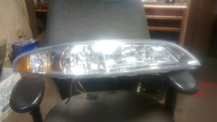 97 Lincoln Mark VIII right headlight assembly