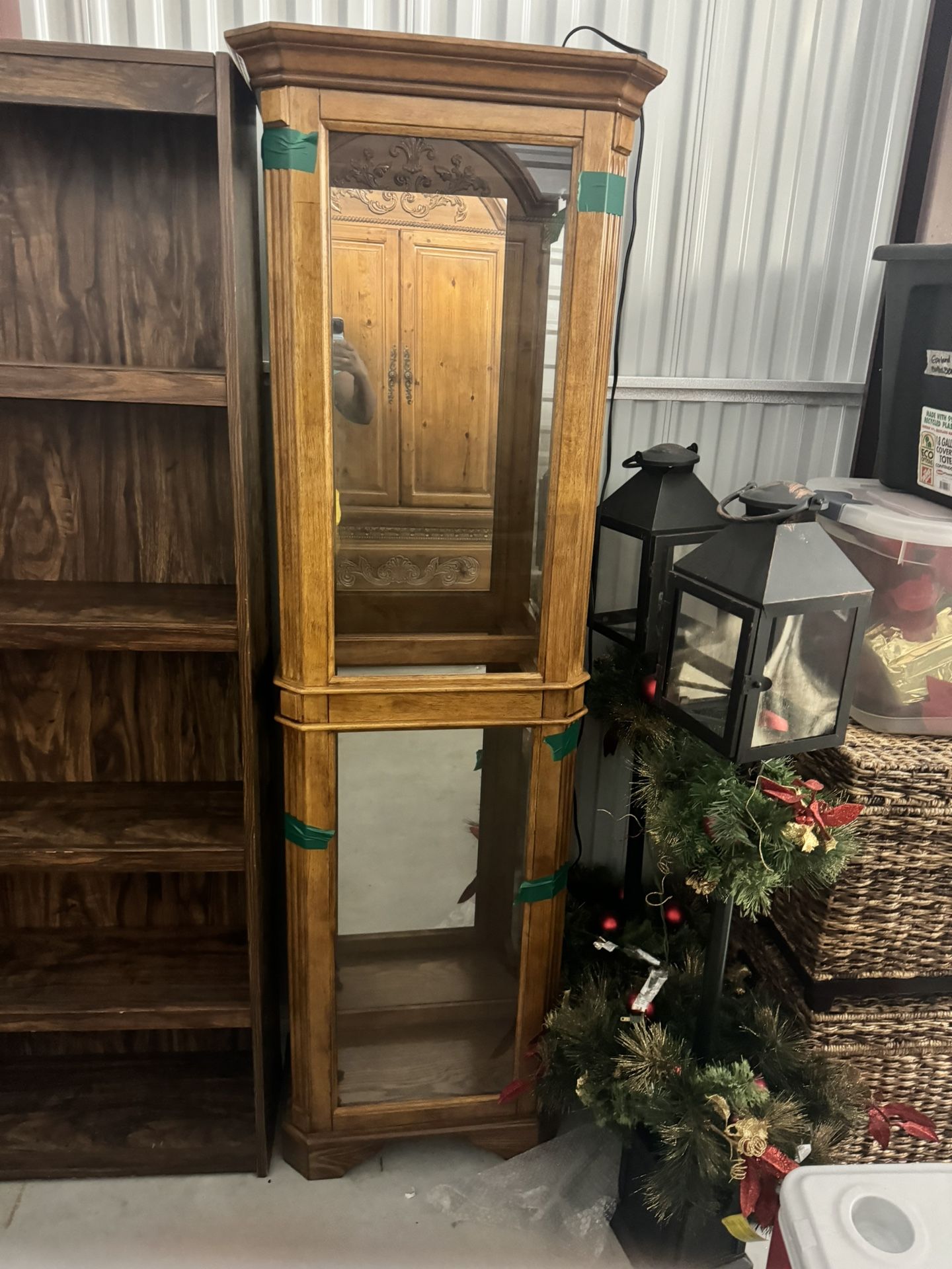 Oak lighted curio cabinet with shelves