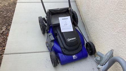 Kobalt 21in, 13 AMP elect lawn mower.  Missing side discharge cover, which we never used it.