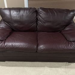 2 Italian Leather Sofas (Natuzzi) + Center Glass table