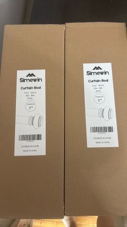 Unopened white curtain Rods