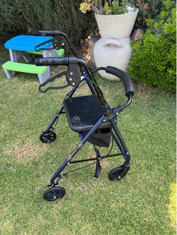 Walker with seat