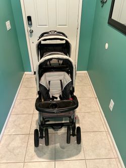 BABY TREND STROLLER/SIT AND STAND