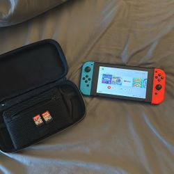 Nintendo Switch (Comes With A Case And 2 60$ Games)