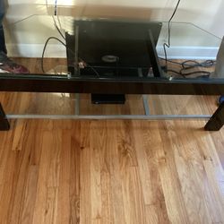 Beautiful glass topped tv stand 