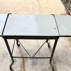 VINTAGE METAL TABLE WITH WHEELS