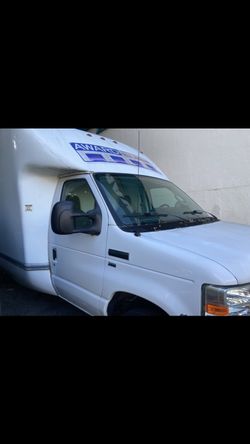 2012 Ford E350 Box truck cutaway with a 16-foot Unicell box and a 5.4L V8 flex-fuel engine