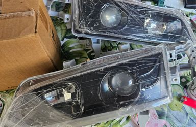 Set of Honda Accord One-Piece Black Projector Headlights set (New/Unused) with lens protection film intact