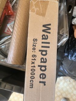 Various Rolls Of Wallpaper