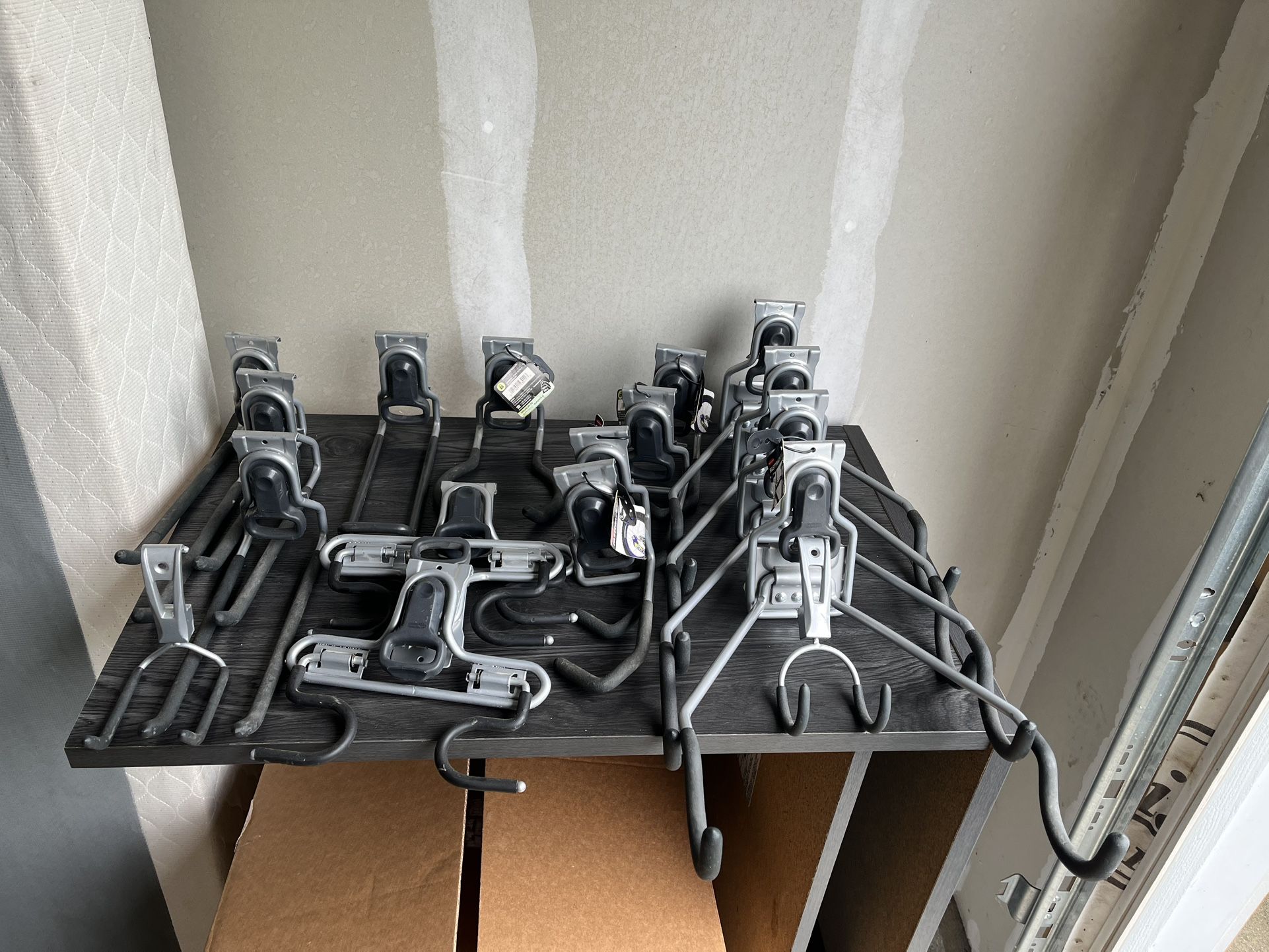 Rubbermaid Fasttrack garage storage solution hooks and baskets