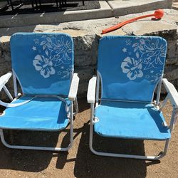 Pair of folding beach chairs.  $5/pair