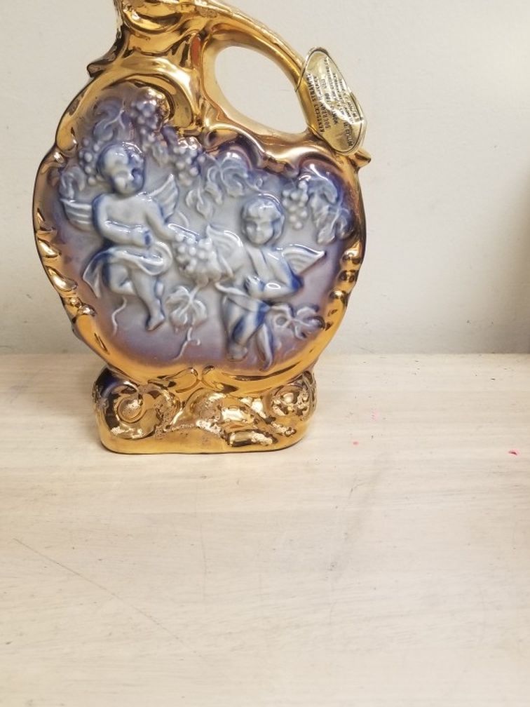 Beam’s 180 Months Empty Cherub Decanter Original Box. Missing Top Cork Still In Bottle In Side Box Saturated