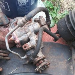 A Power Steering Box And Pump Out Of 85 Chevy Dually .