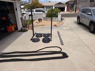 Rogue ES-1 Squat Rack, Bumper Plates, Barbell, and Battle Rope Set