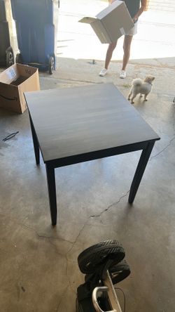 Black table with two chairs