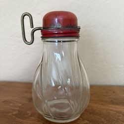 Vintage turn key glass nut/spice grinder. 