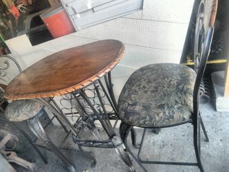 Tall Pub Table With Wine Rack And Two Chairs 