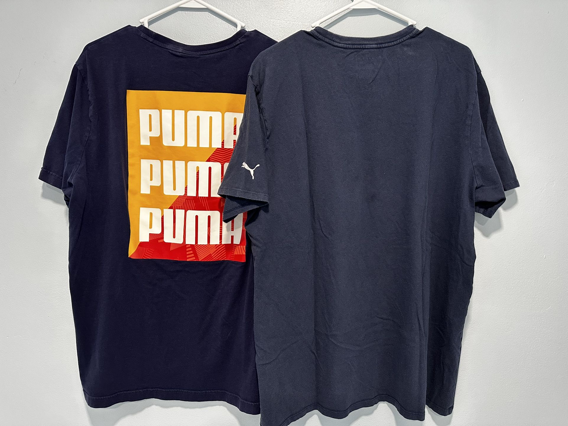 2 Navy Blue Puma T-Shirts size XL.