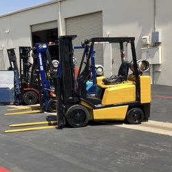 FORKLIFTS OFF-ROAD TIRES IN WAREHOUSE 