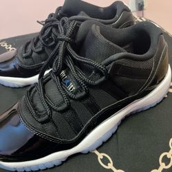 Women’s Air Jordan 11 Retro Low "Space Jam" sneakers.