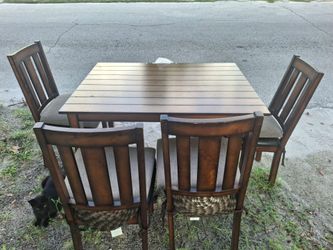 Wooden kitchen table with chairs