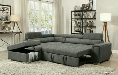 Brand New Grey Polished Microfiber Sectional With A Pull Out Bed Storage Ottoman & Adjustable Headrest