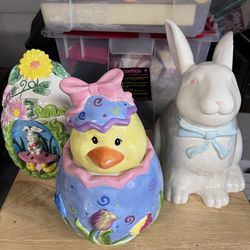 Three Easter cookie jars with storage box