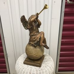 Angel Playing A Golden Horn