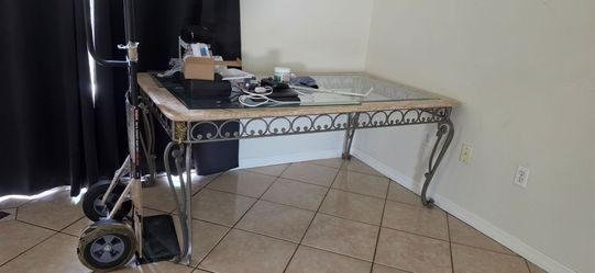 Glass table with 5 chairs.