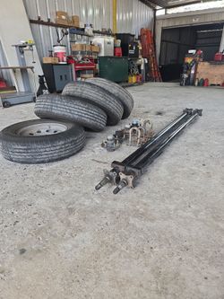 4 tires and rims 5 on 5  ( 4 hub 3500 lbs and 2 axle 74 spring center ( 4  u bolt