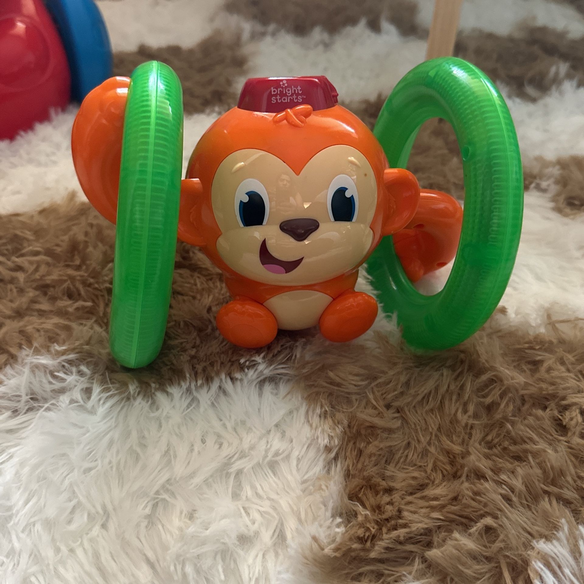 Bright Starts Roll & Glow Monkey Baby Toy with Lights and Melodies, Ages 6 Months +