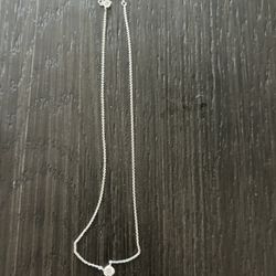 Silver necklace with rhinestone pendant 
