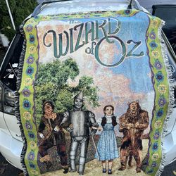 Wizard of Oz Tapestry new w/tags. ($70 new)  Measures 42 x 68 inches.  $40 cash or Venmo. Meet in person somewhere convenient. I live in Vancouver.  T