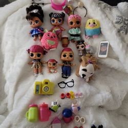 Lol surprise doll lot with miscellaneous pieces.