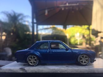 Hot wheels 70 ford escort with real riders