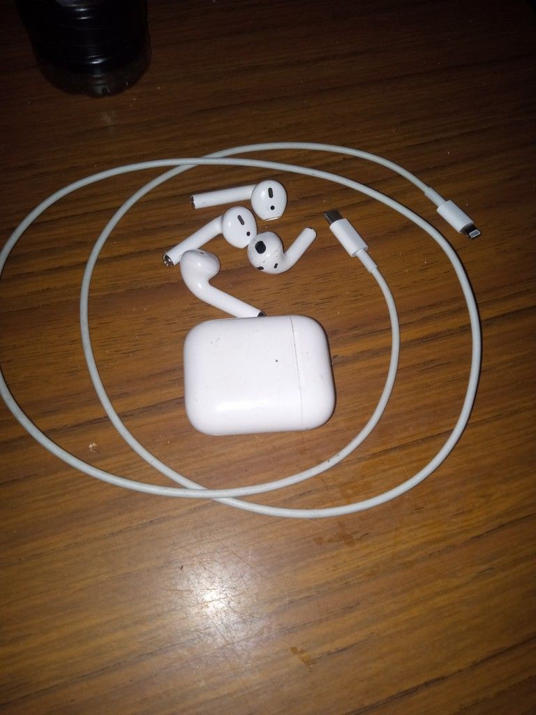Apple Air Pods 2nd Gen.. Fitbit Tracker And Charger 