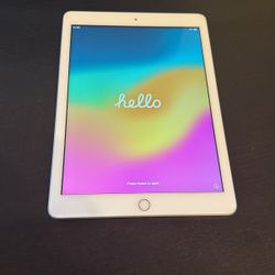 Apple iPad 6th Generation A1954 MR702LL/A 32 GB Silver And White Tablet WiFi + 4G Unlocked GSM/CDMA