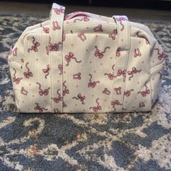Cream Bow Duffle Bag